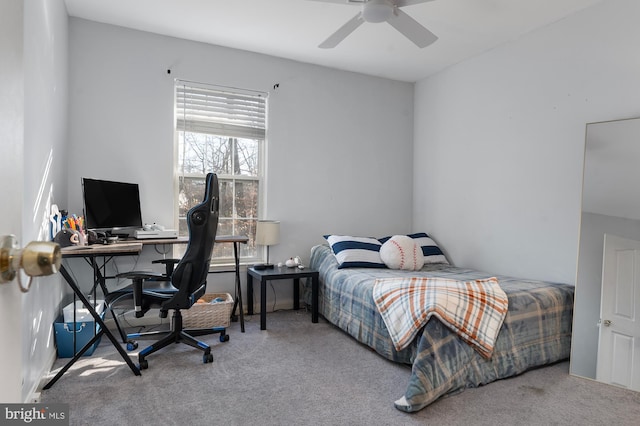 carpeted bedroom with ceiling fan