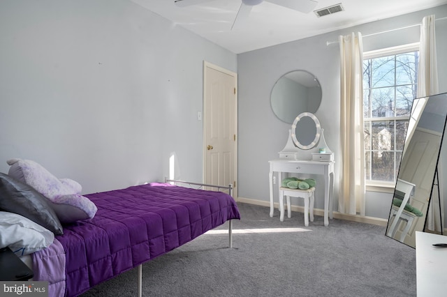 bedroom with ceiling fan and carpet