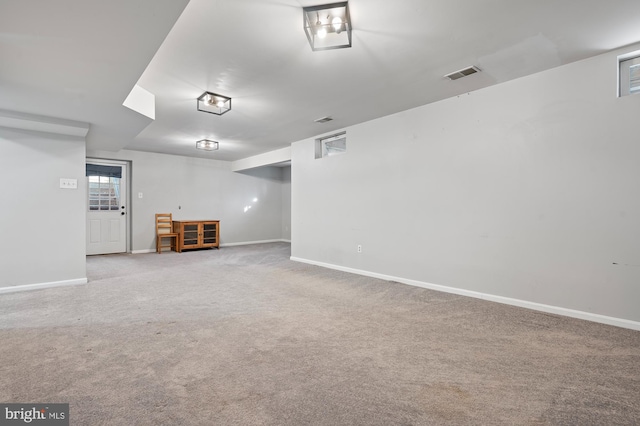 basement with carpet flooring