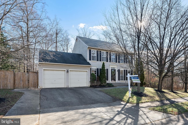 colonial-style house with a garage