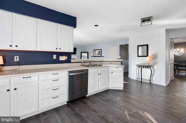 kitchen with stainless steel dishwasher, kitchen peninsula, white cabinetry, and dark wood-type flooring