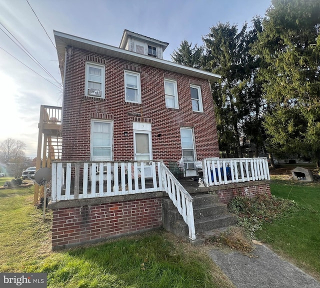 5 Brent St, Hancock, MD 21750 - view of front of house featuring brick siding and a front lawn