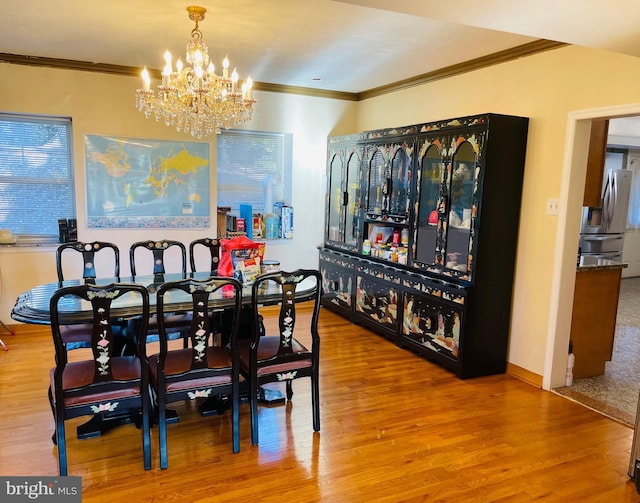 1503 Juniper Ave, Elkins Park, PA 19027 - dining area with ornamental molding, a chandelier, and wood finished floors