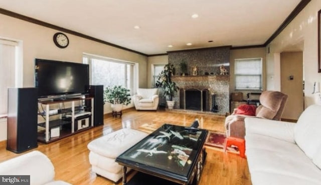 1503 Juniper Ave, Elkins Park, PA 19027 - living room with ornamental molding, wood finished floors, a fireplace, and recessed lighting
