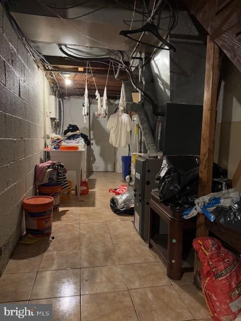 basement featuring tile patterned floors