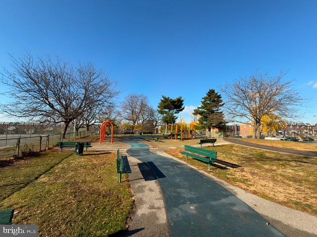 surrounding community featuring a lawn