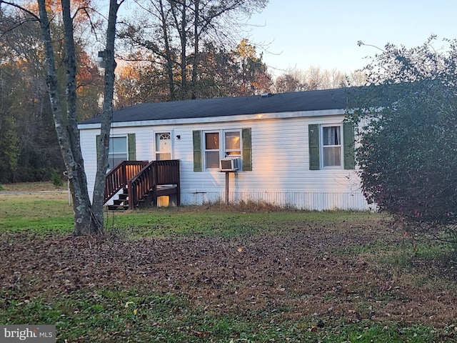 manufactured / mobile home featuring cooling unit