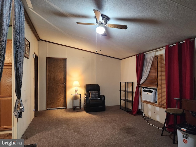 sitting room featuring carpet flooring, a textured ceiling, ceiling fan, and cooling unit