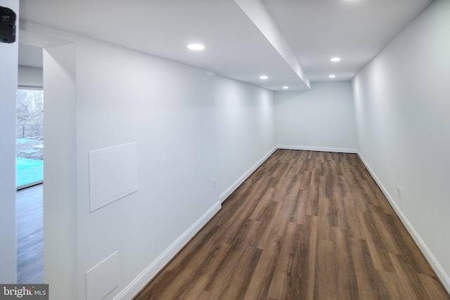 empty room featuring dark wood-type flooring