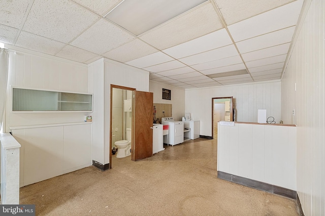 interior space featuring a drop ceiling