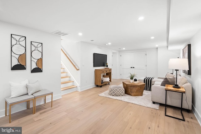 living room featuring light hardwood / wood-style flooring