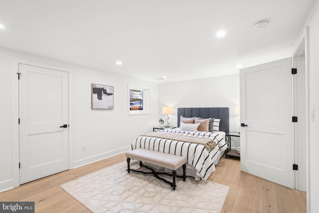 bedroom featuring light hardwood / wood-style floors