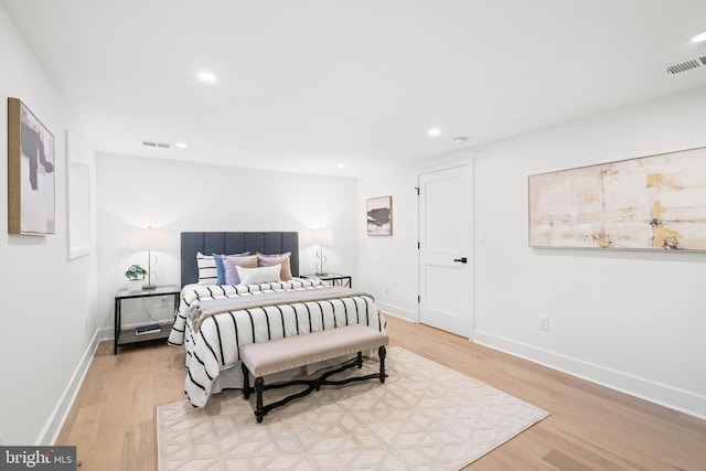 bedroom with light hardwood / wood-style flooring