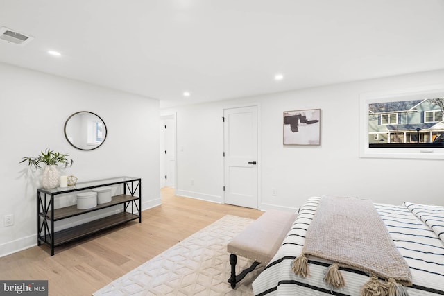 bedroom with light wood-type flooring