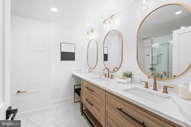 bathroom featuring vanity and an enclosed shower