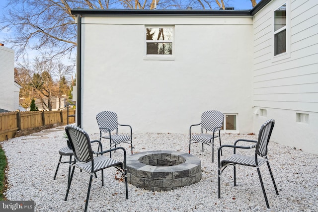 view of patio / terrace featuring an outdoor fire pit