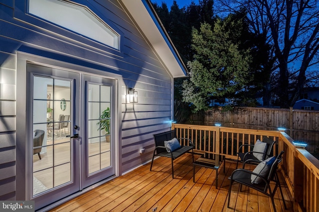 wooden terrace featuring french doors