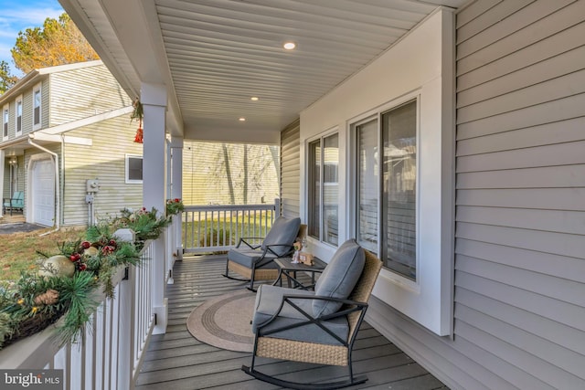 balcony featuring a porch