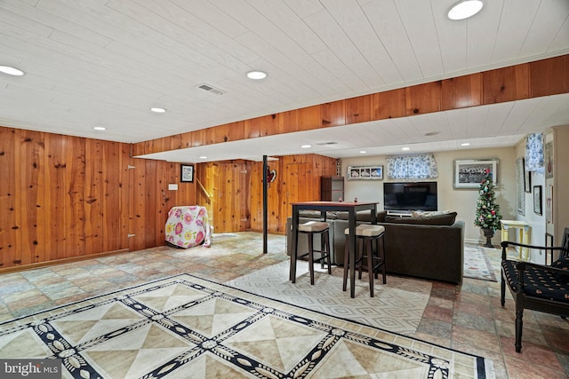 10501 Glenhaven Dr, Silver Spring, MD 20902 - living room with recessed lighting and wood walls