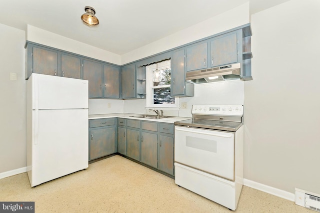 kitchen featuring white appliances, baseboard heating, and sink