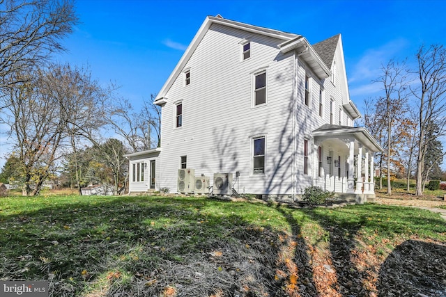 view of property exterior featuring a yard