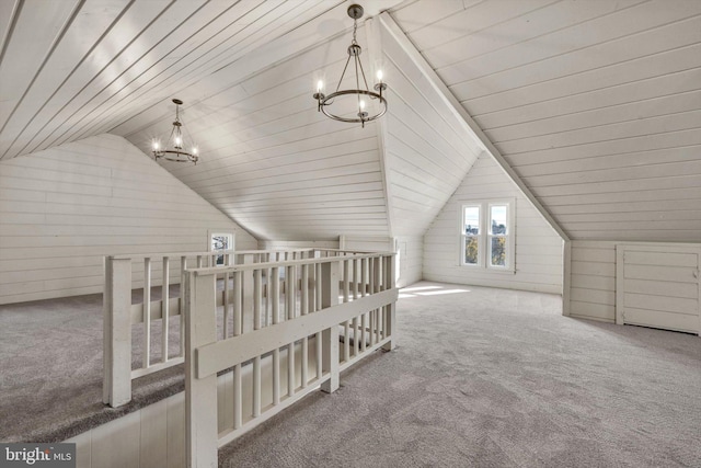 bonus room featuring carpet flooring, lofted ceiling, and wood ceiling