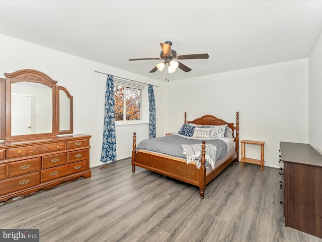 bedroom featuring ceiling fan and wood-type flooring