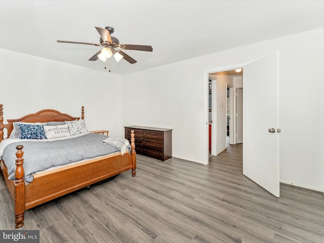 bedroom featuring hardwood / wood-style floors and ceiling fan