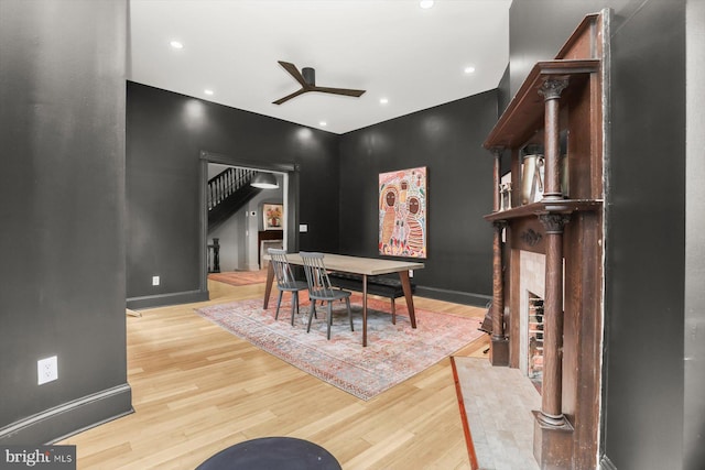 dining area featuring ceiling fan and light hardwood / wood-style flooring