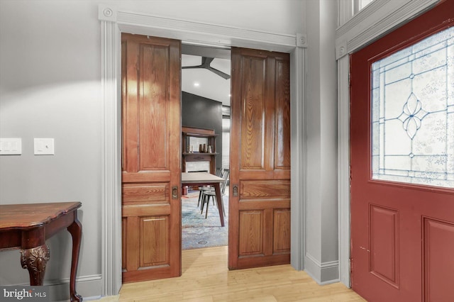 foyer with light hardwood / wood-style floors