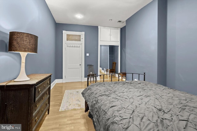 bedroom featuring light wood-type flooring