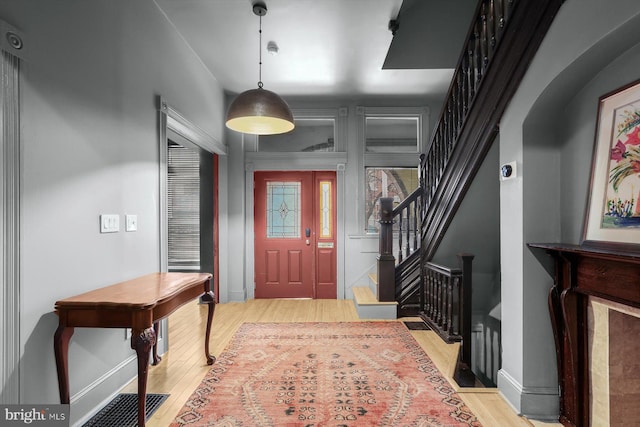 entryway with light hardwood / wood-style floors