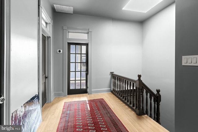 doorway to outside featuring light wood-type flooring