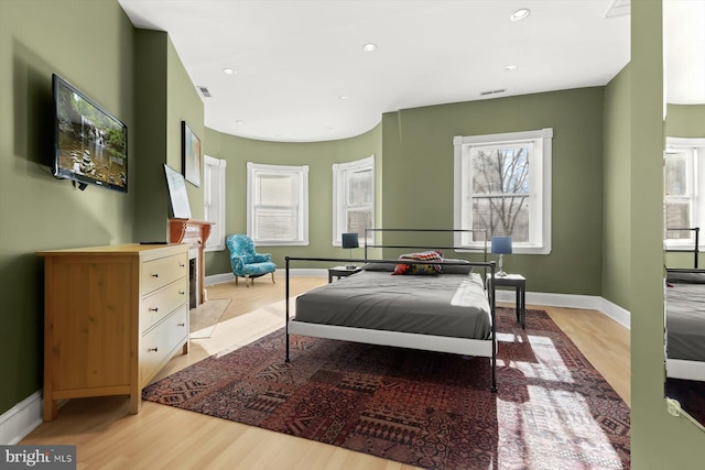 bedroom featuring light hardwood / wood-style floors