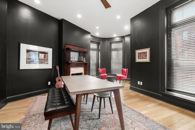 dining space featuring light wood-type flooring