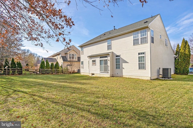 1721 Dearbought Dr, Frederick, MD 21701 - rear view of house with central AC unit, fence, and a yard