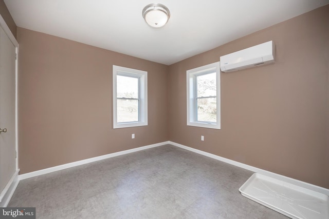 empty room featuring an AC wall unit