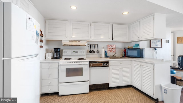 kitchen featuring sink, white appliances, white cabinetry, and custom exhaust hood