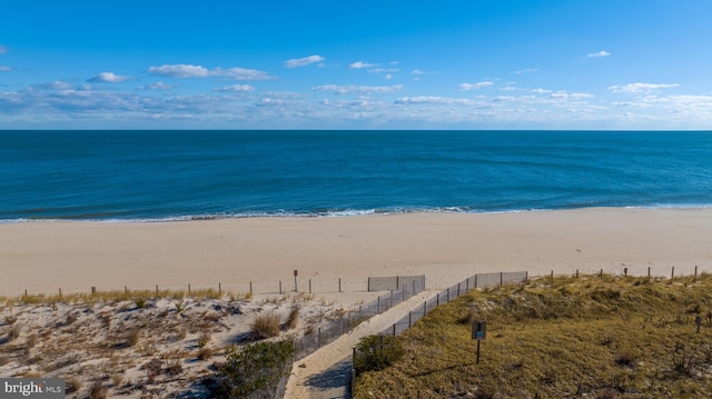 view of water feature with a beach view