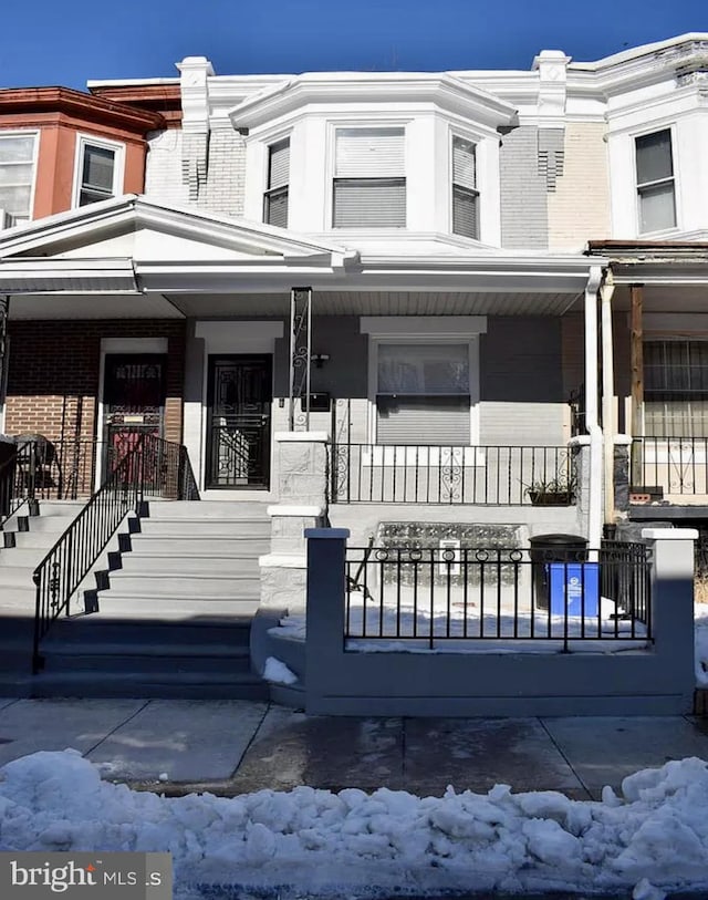 view of front of property featuring covered porch