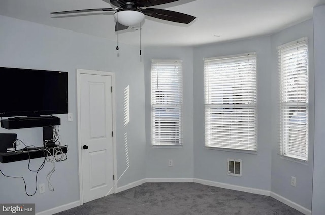 bedroom with ceiling fan and carpet floors