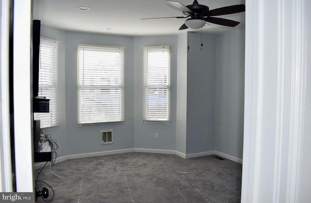 unfurnished room featuring carpet and ceiling fan