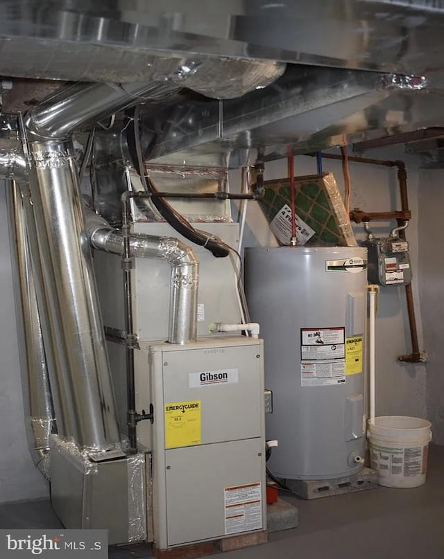 utility room with water heater