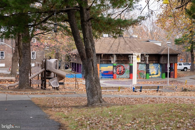 view of home's community with a playground