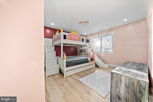 bedroom with light hardwood / wood-style flooring