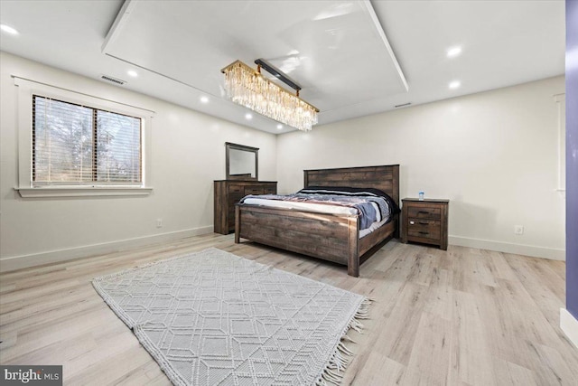 bedroom featuring light hardwood / wood-style floors