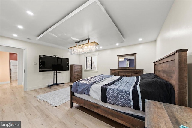 bedroom with light hardwood / wood-style flooring