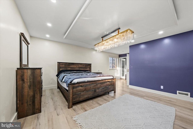 bedroom featuring light hardwood / wood-style flooring