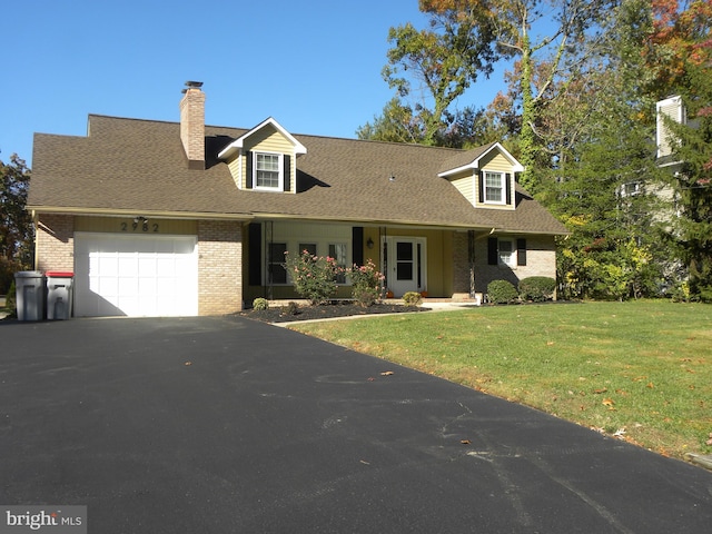 new england style home with a front yard