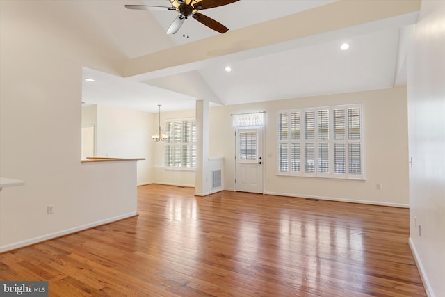101 Forget Me Not Dr, White Post, VA 22663 - unfurnished living room featuring a chandelier, a ceiling fan, wood finished floors, lofted ceiling, and baseboards